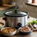 Collection of 31 easy slow cooker recipes including chicken and dumplings, beef stew, and pulled pork for busy weeknight dinners